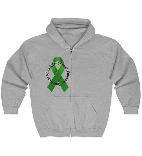 A gray zip-up hoodie features a green awareness ribbon on the front, wrapped with the bold message “End Vicious Silent Rude Stigma.” The design uses the ribbon as a central symbol to challenge harmful perceptions and promote mental health advocacy. The hoodie blends comfort with a powerful call to action, making it both a statement piece and a tool for visibility.