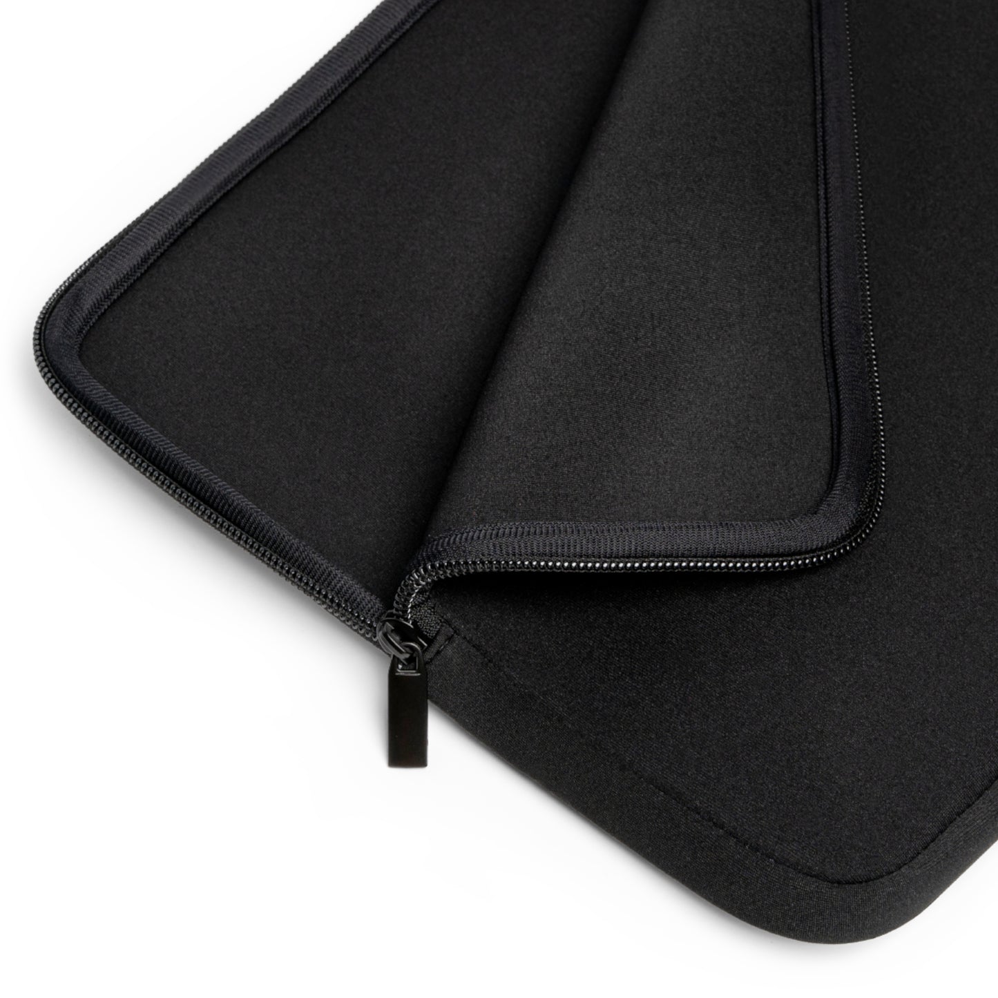 A laptop sleeve features a grayscale, upside-down artistic portrait of a man's face, emphasizing expressive eyes, a defined nose, lips, and a prominent mustache. A small green awareness ribbon appears in the bottom right corner, symbolizing support for causes like mental health. The sleeve includes a zipper on the left side, combining secure functionality with bold, personal expression and advocacy.