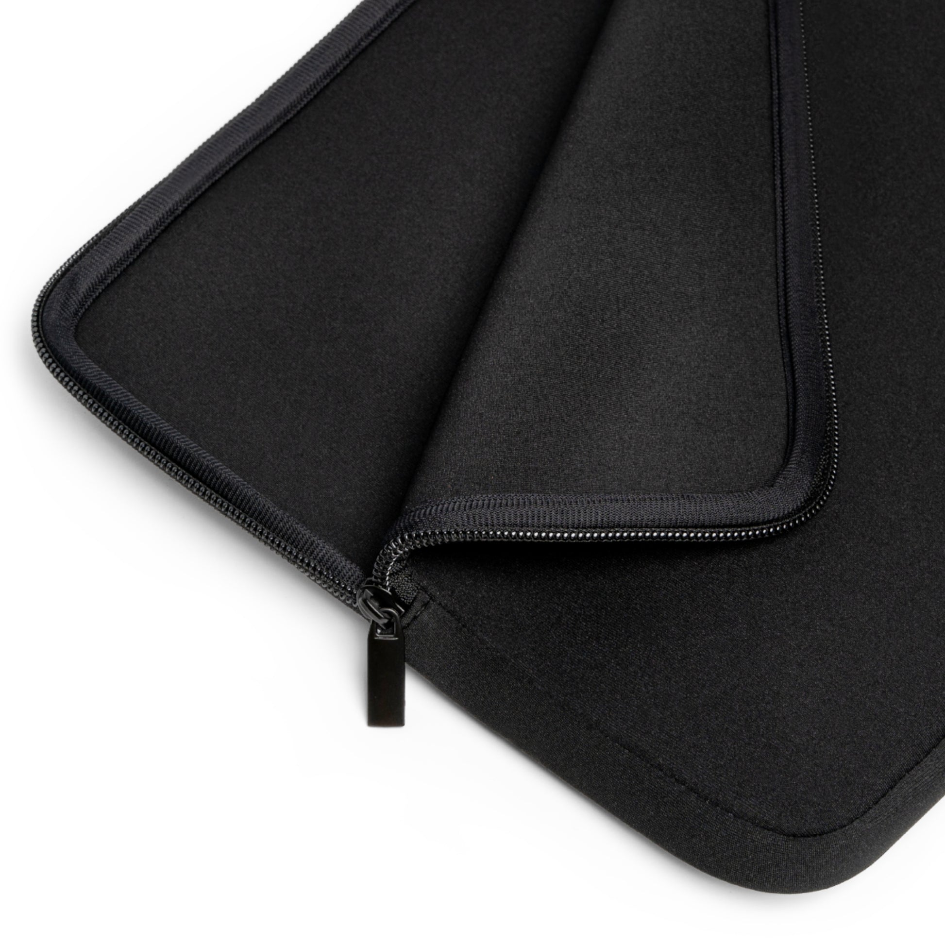 A laptop sleeve features a grayscale, upside-down artistic portrait of a man's face, emphasizing expressive eyes, a defined nose, lips, and a prominent mustache. A small green awareness ribbon appears in the bottom right corner, symbolizing support for causes like mental health. The sleeve includes a zipper on the left side, combining secure functionality with bold, personal expression and advocacy.